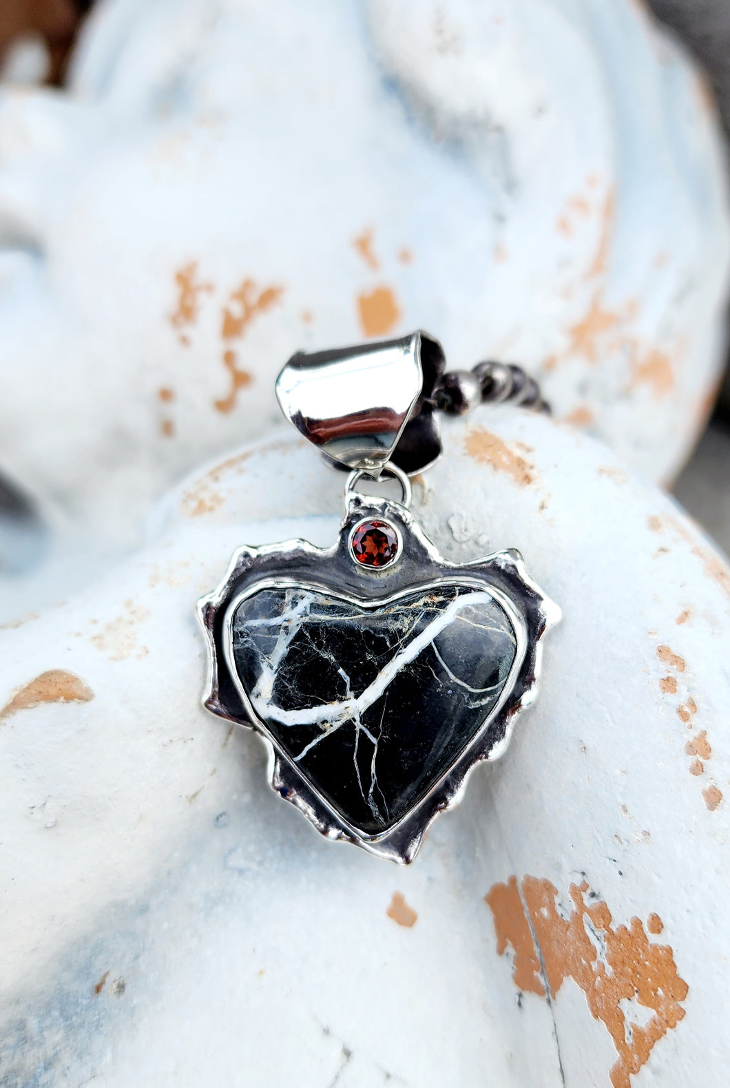 White Buffalo and Red Garnet Pendant Necklace